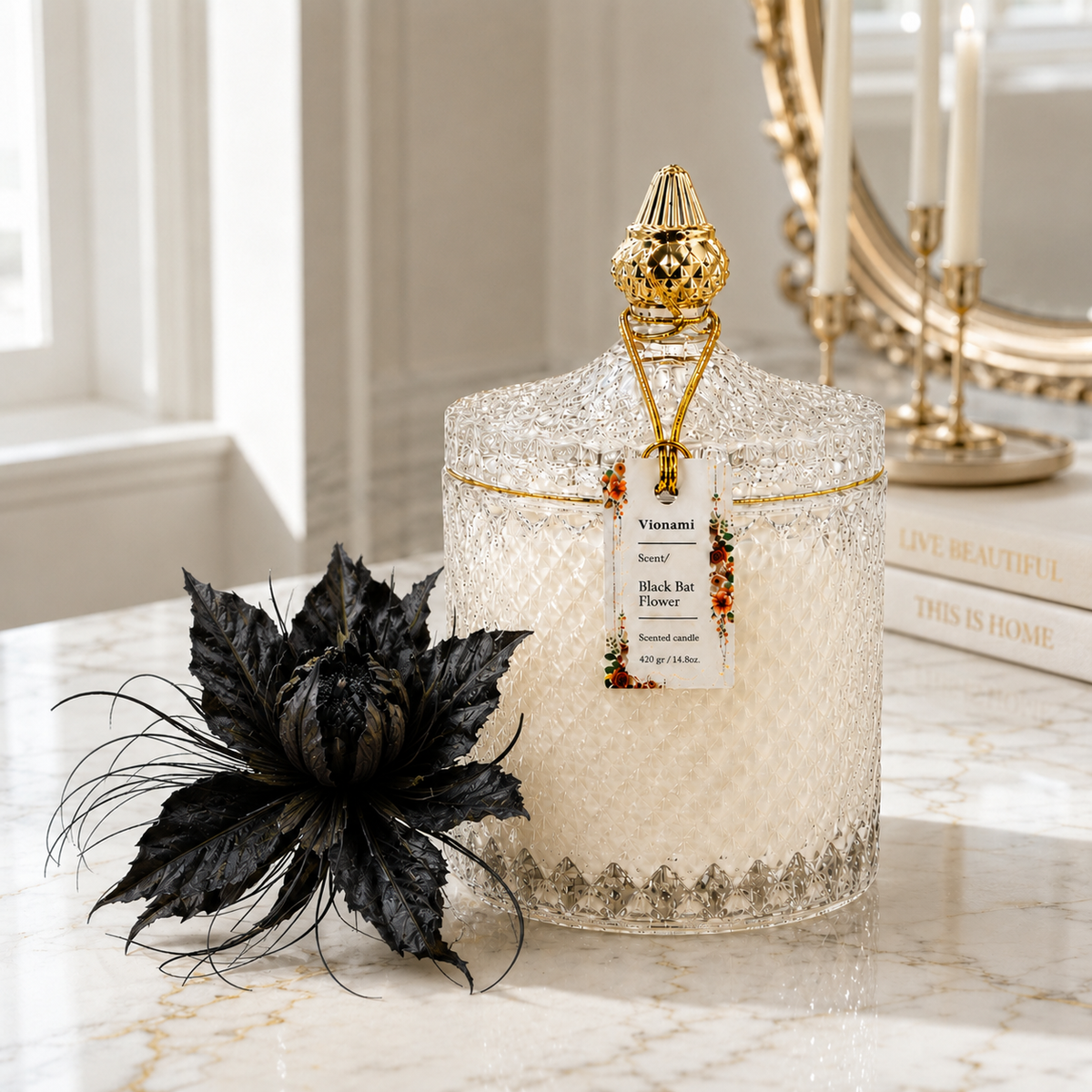 Luxury floral soy candle styled with exotic dark bloom on marble — Black Bat Flower by Vionami