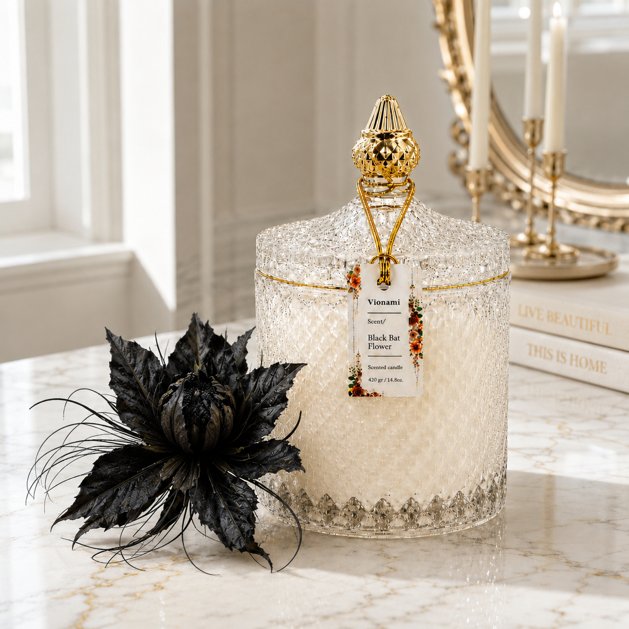 Luxury floral soy candle styled with exotic dark bloom on marble — Black Bat Flower by Vionami