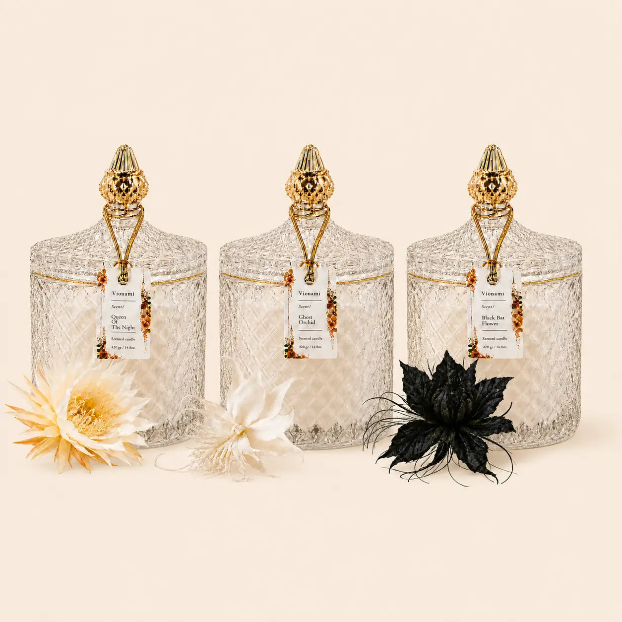 Vionami Rare Flower Trio luxury candle collection in diamond-cut glass jars with gold lids — Queen of the Night, Ghost Orchid, Black Bat Flower